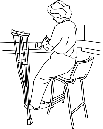 Sitting on a high stool makes it easier to work at the kitchen counter.