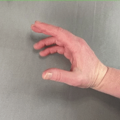 Side view of thumb, index, and middle fingers moving together. How a pencil is held when writing.